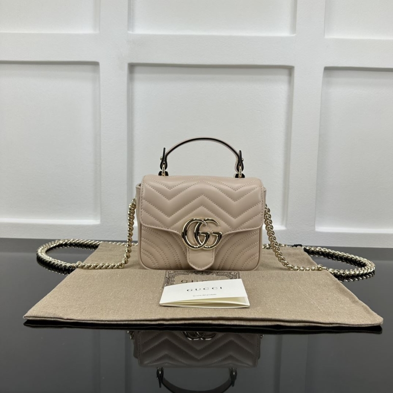 G*u*i top handle bags
